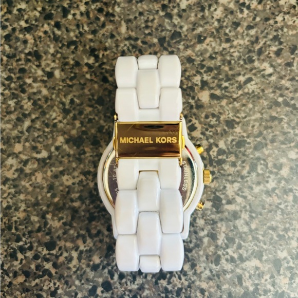 Oversized Michael Kors gold and white tone watch. - Picture 2 of 3